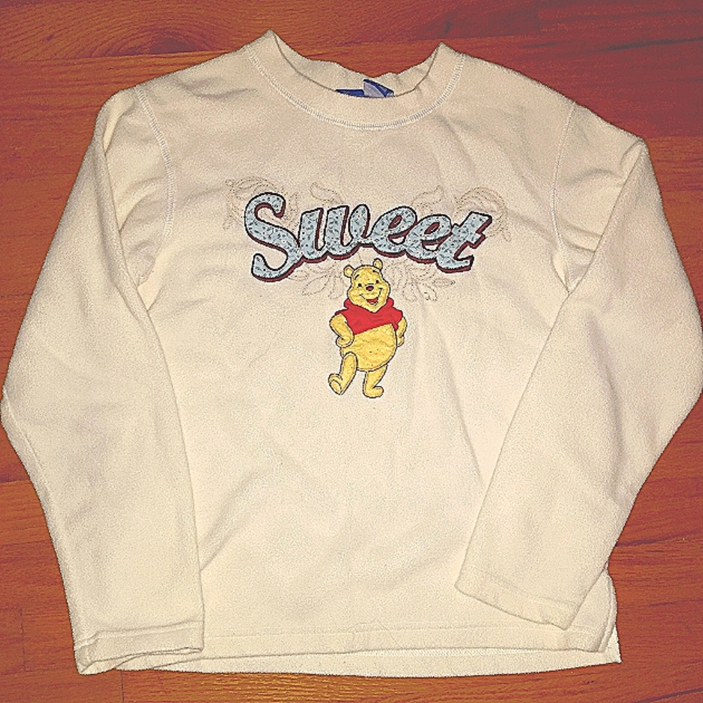 Disney cream colored fleece sweatshirt Size small